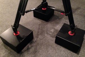 image of three mounted black camera isolation stands