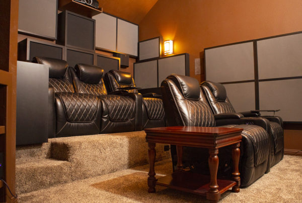 Home Theater with bass traps on wall
