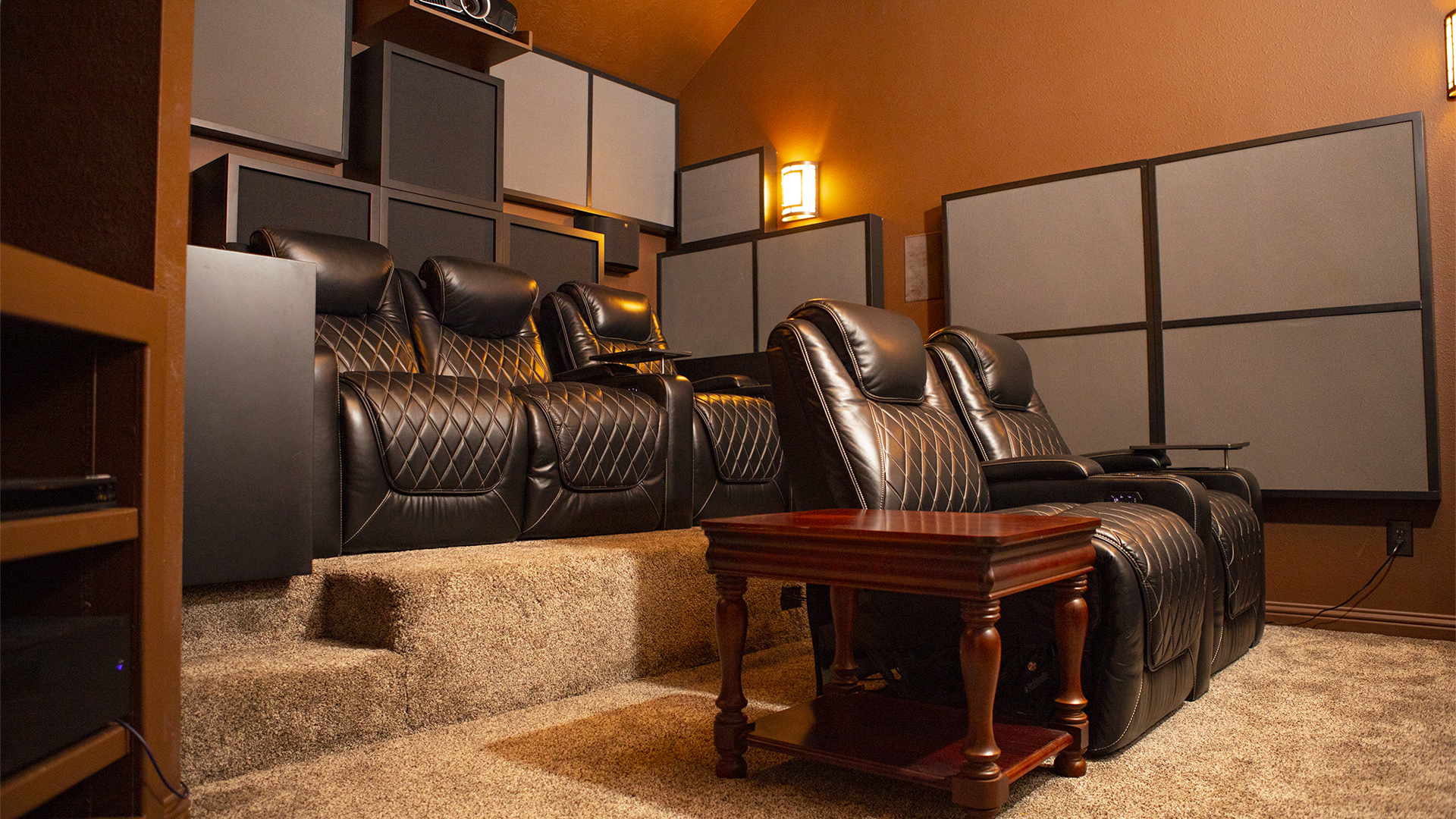 Home Theater with bass traps on wall